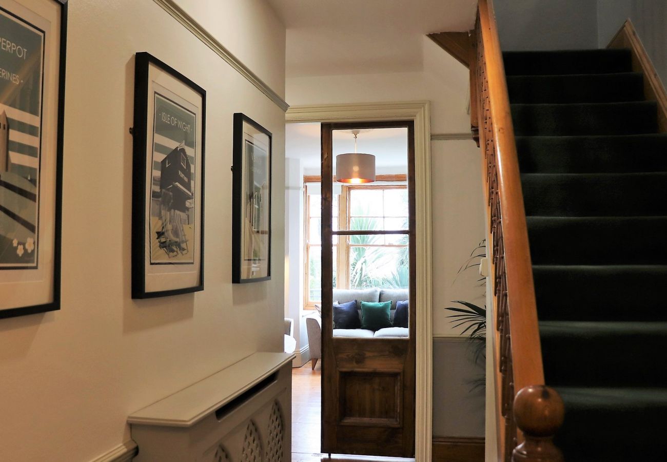 Tastefully decorated hallway and stairs