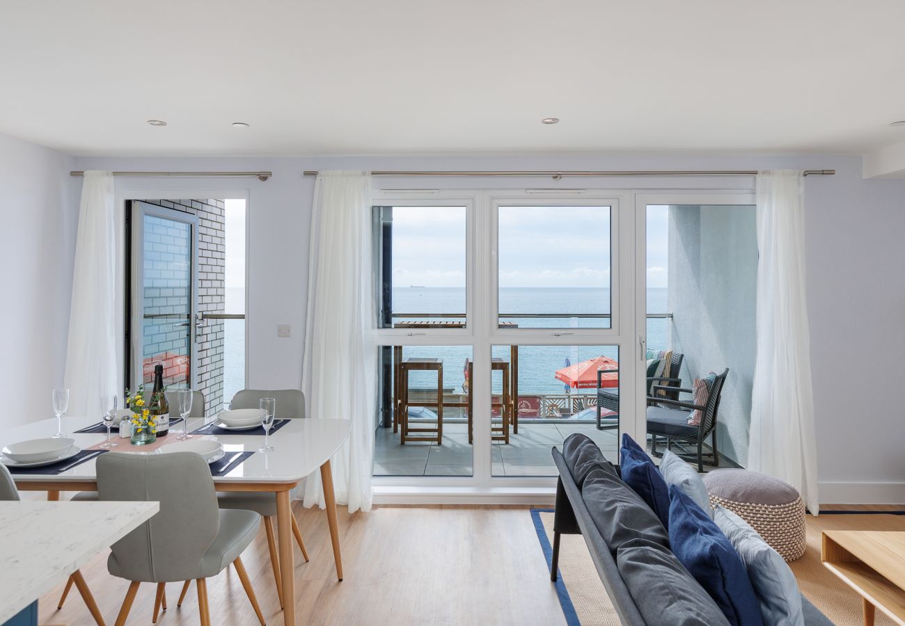 Modern living area with comfortable seating at Culver Sands holiday apartment.
