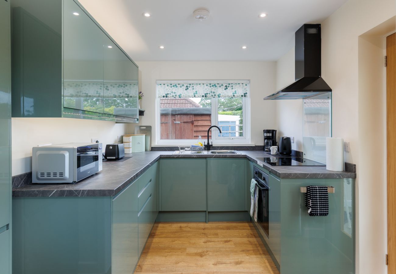 Fully equipped kitchen in modern holiday home