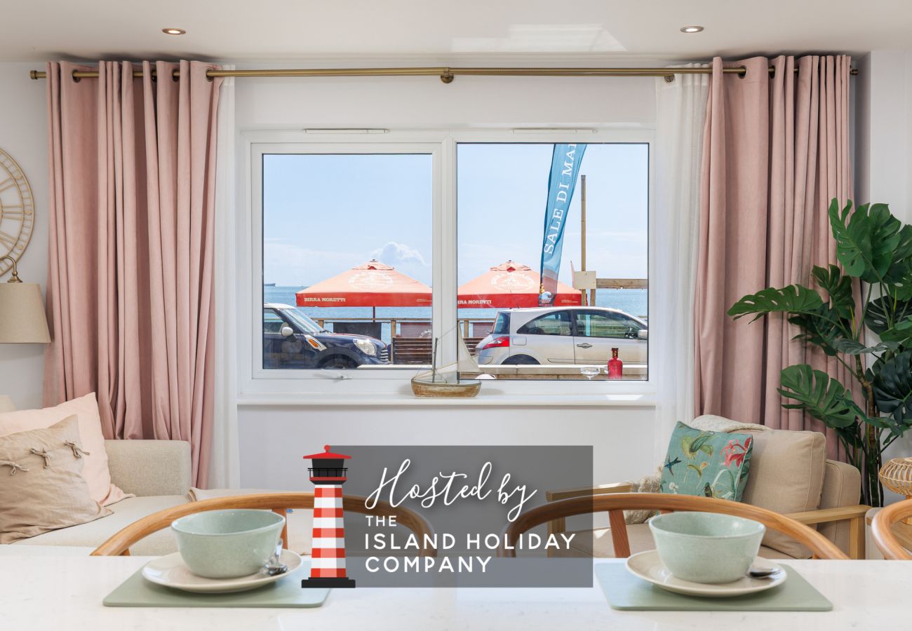 Breakfast bar with views through the window at Hummingbird ground-floor apartment on Sandown seafront.